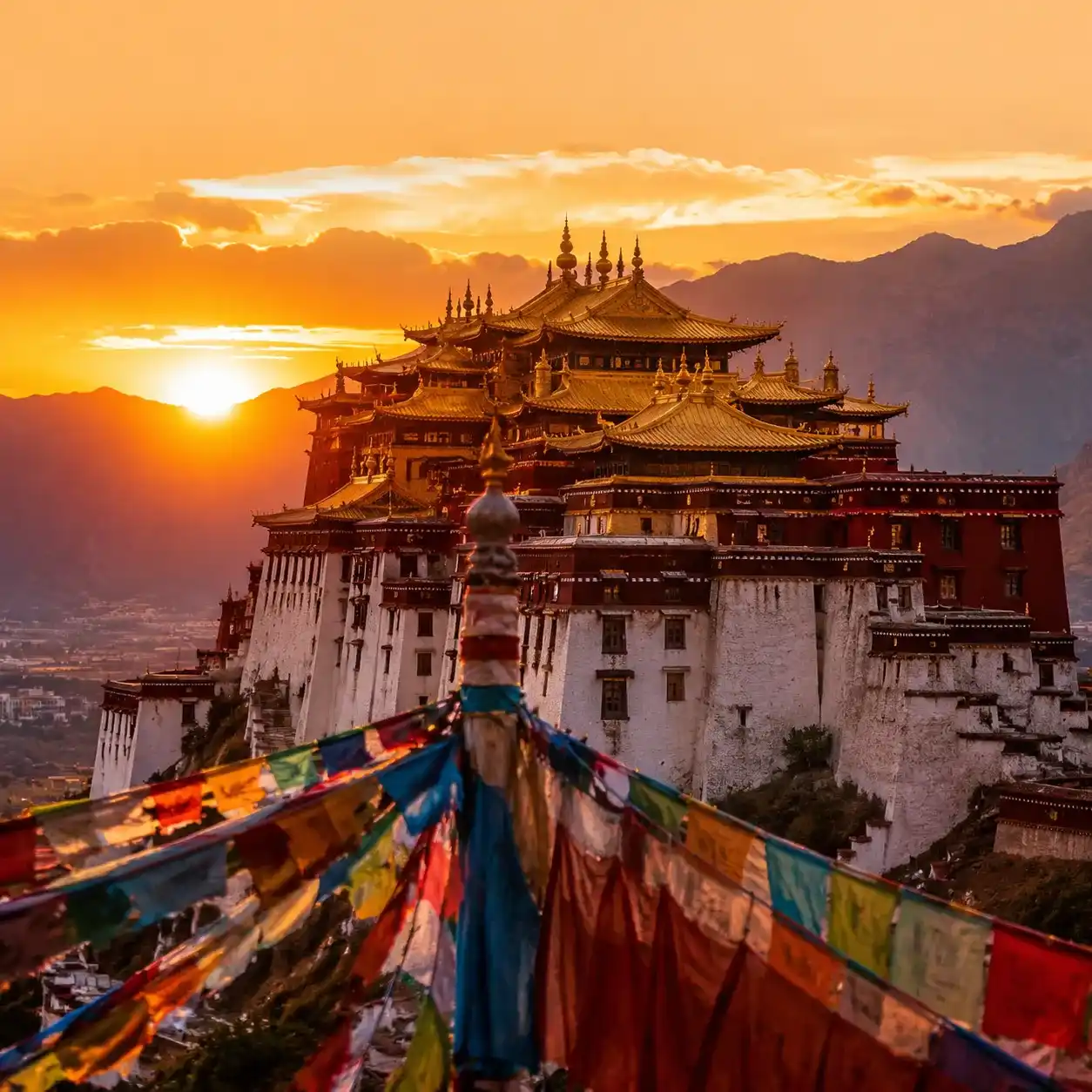 Potala Palace golden roofs glowing at sunset